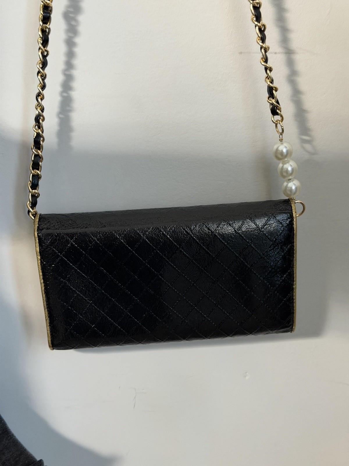 CHANEL Black Quilted Flap WOC Gold Hardware Chain Strap Pearl Accents