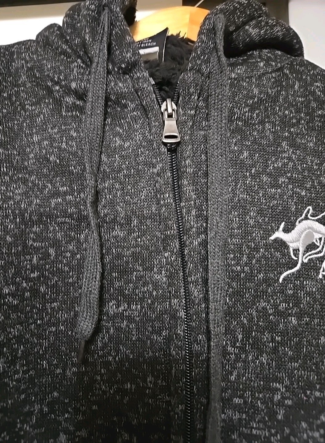 Australia Size Small hooded Jacket. It has a Kangaroo Embroidered on The Front