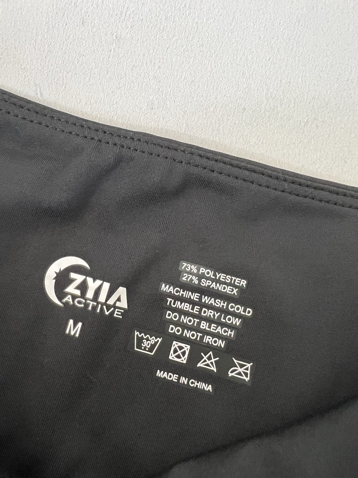 Zyia Active Womens Size Medium Biack Cropped Side Pockets Leggings Logo