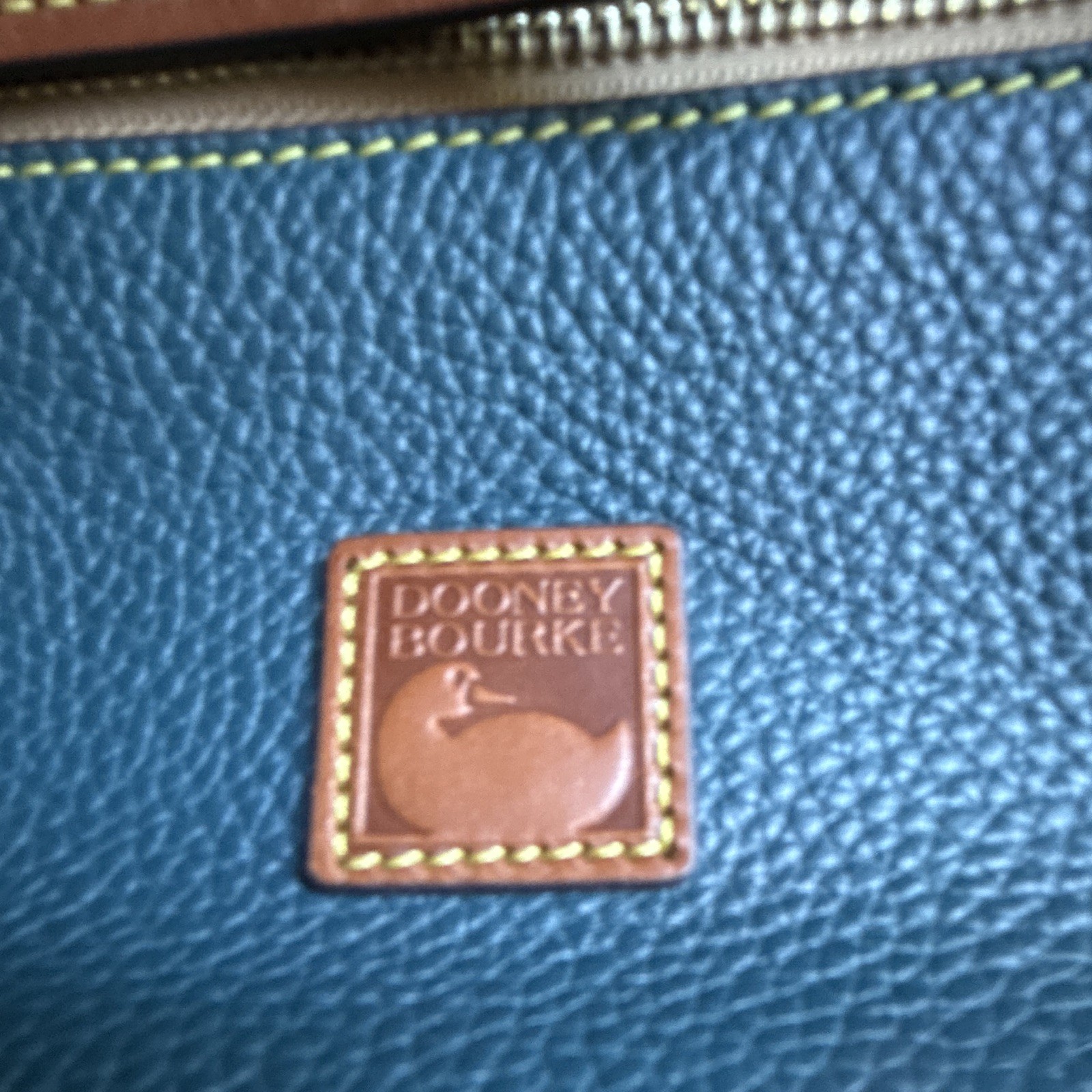 Dooney & Bourke Pebble Grain Blue/Brown Crossbody Zip, Adjustable Strap, Pockets