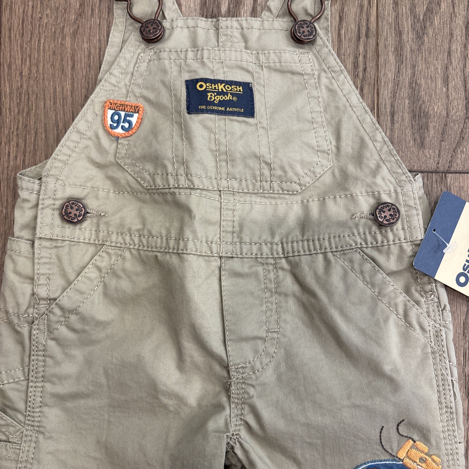 OshKosh B’Gosh Khaki Shorts Overalls W/ Highway 95 & Racer Car Size 3 Month