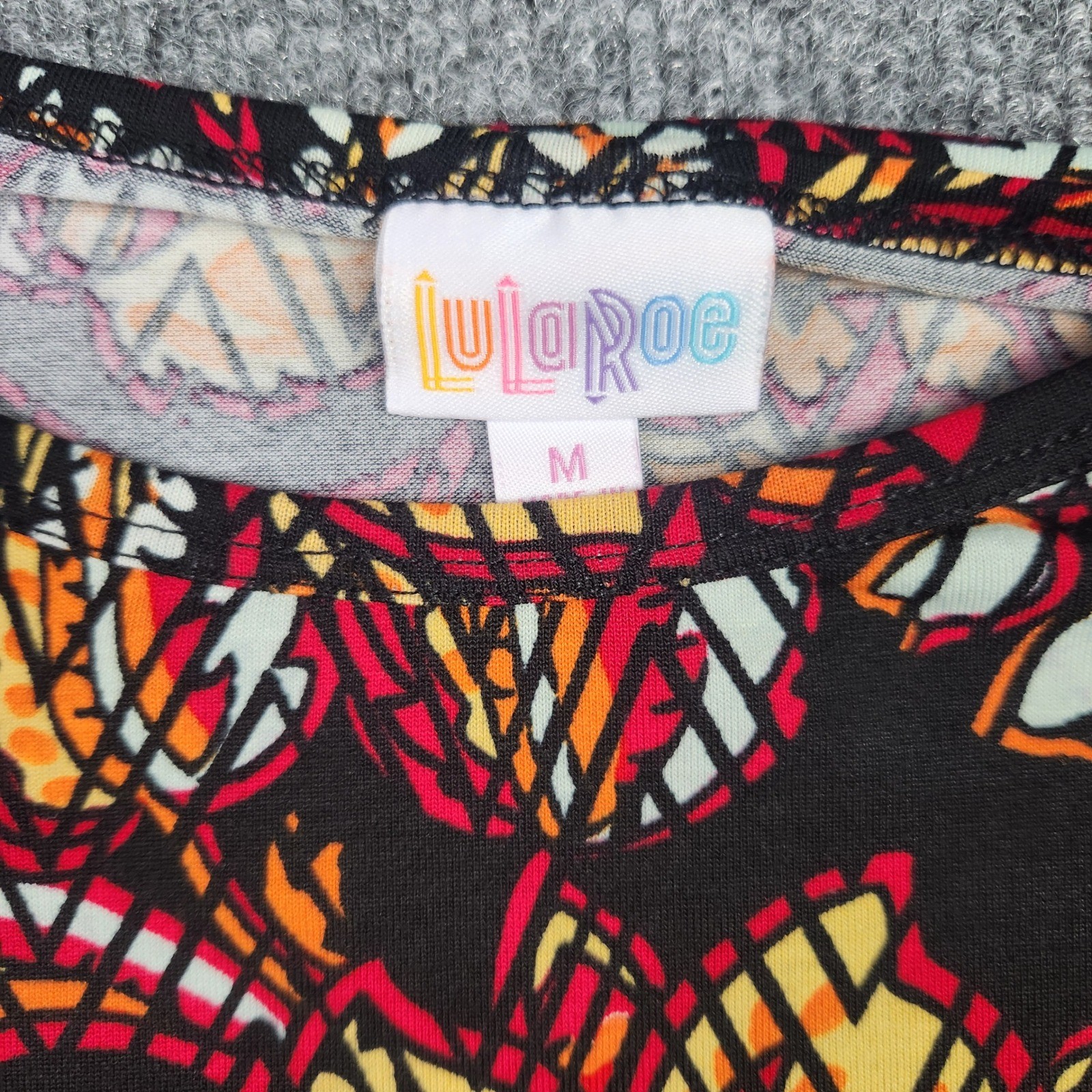 LuLaRoe Irma Tunic Top Womens Medium NWT Black Red Orange Floral High Low Hem