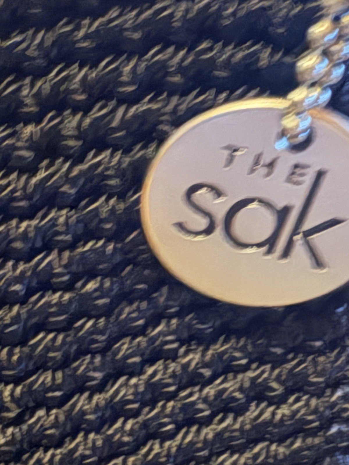 “The Sak Elliot Luca” Black Woven Bag 13 X 8.75 X 4” W/charm Excellent