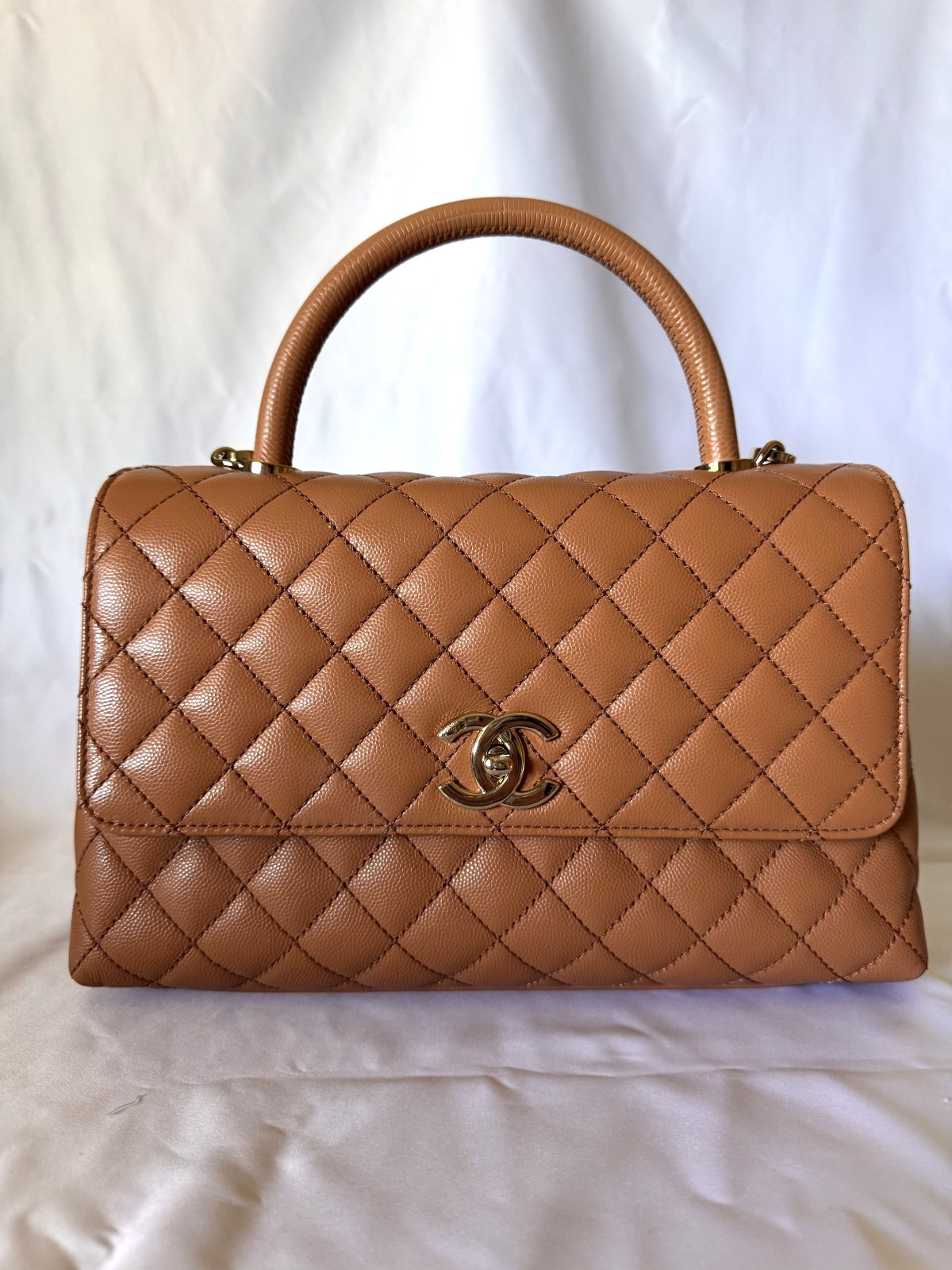 Chanel small flap bag with top handle caramel/cognac brown caviar leather
