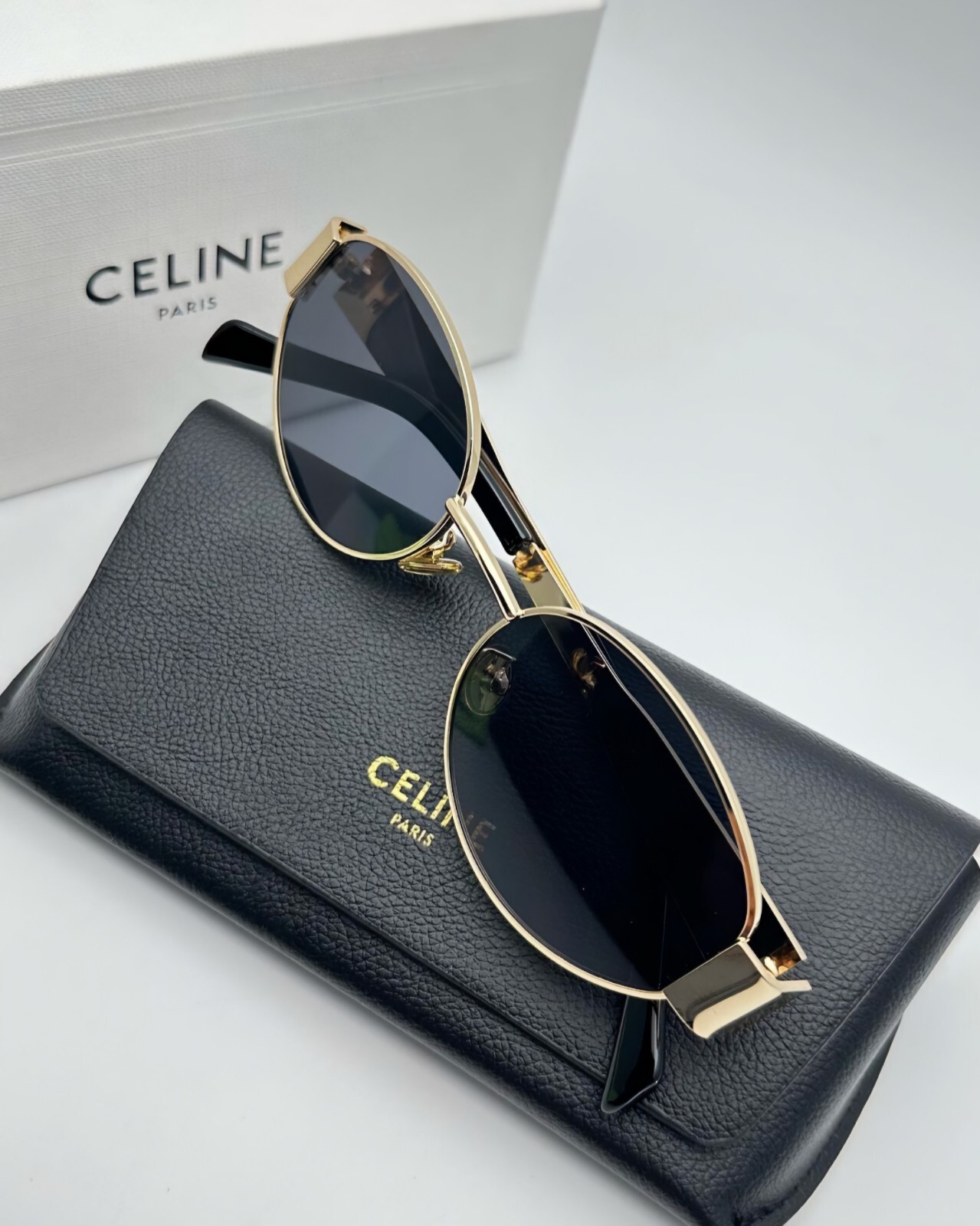 Sunglasses for women Celine Triomphe golden metal glasses. Oval.