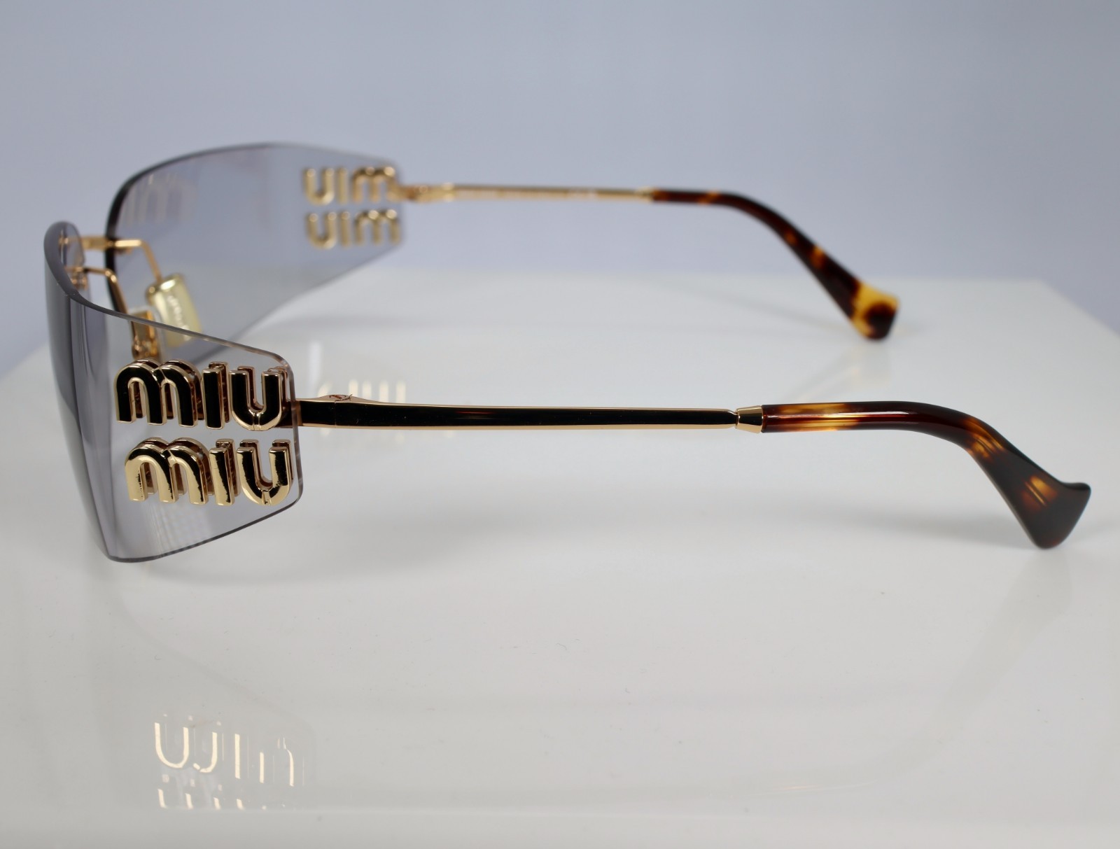 Miu Miu MU A51S 5AK50K 75mm Rectangle Sunglasses in Gold with Light Gray Lenses