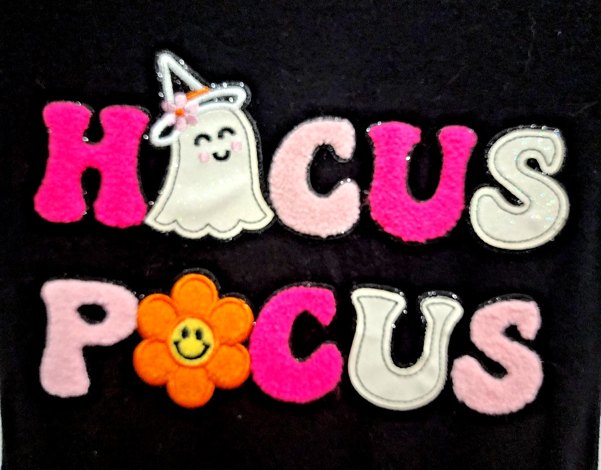 Counting Daisies girls 7 – 8 Black Hocus Pocus dress. Colorful sequins