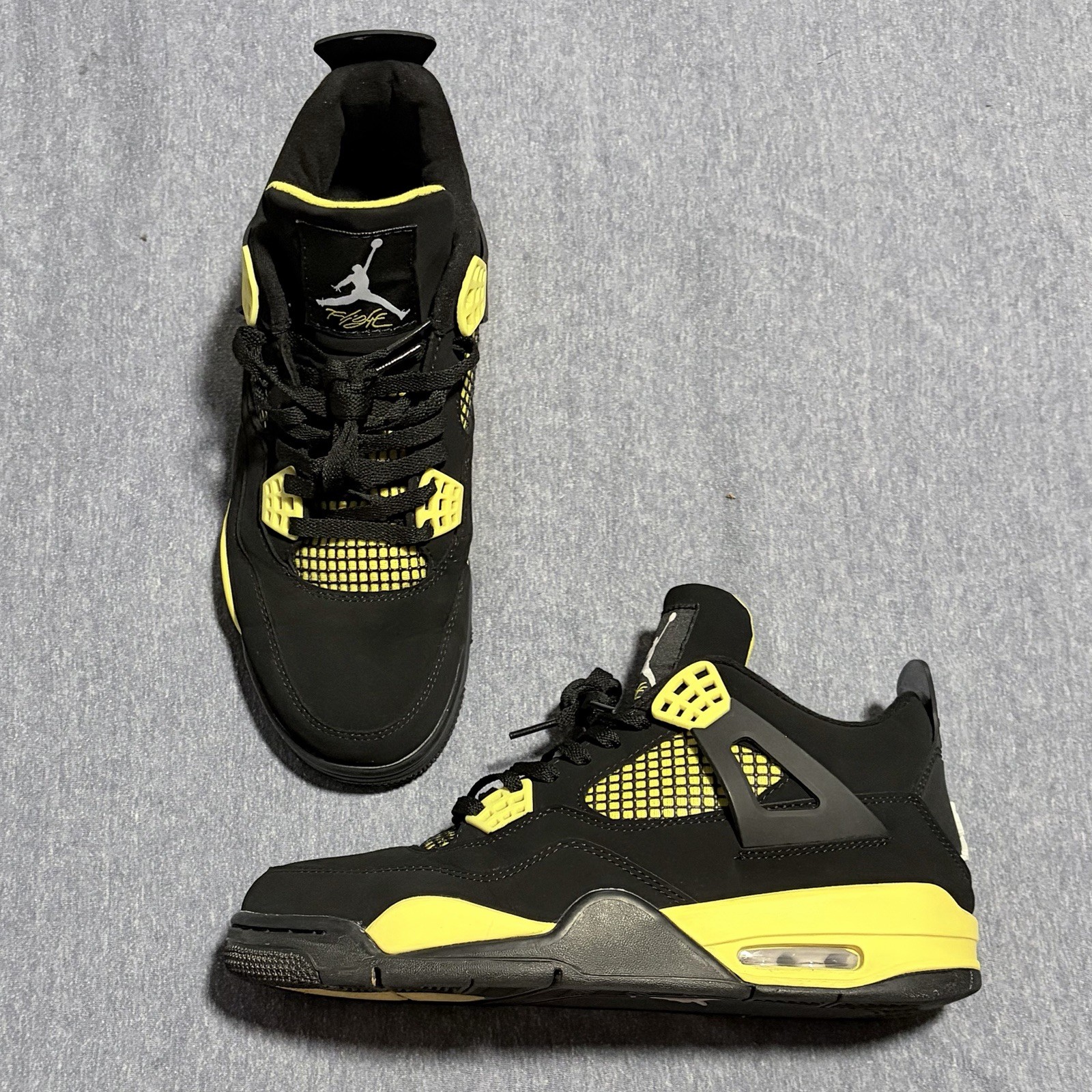 Jordan 4 Retro Thunder. Black/Tour Yellow DH6927-017