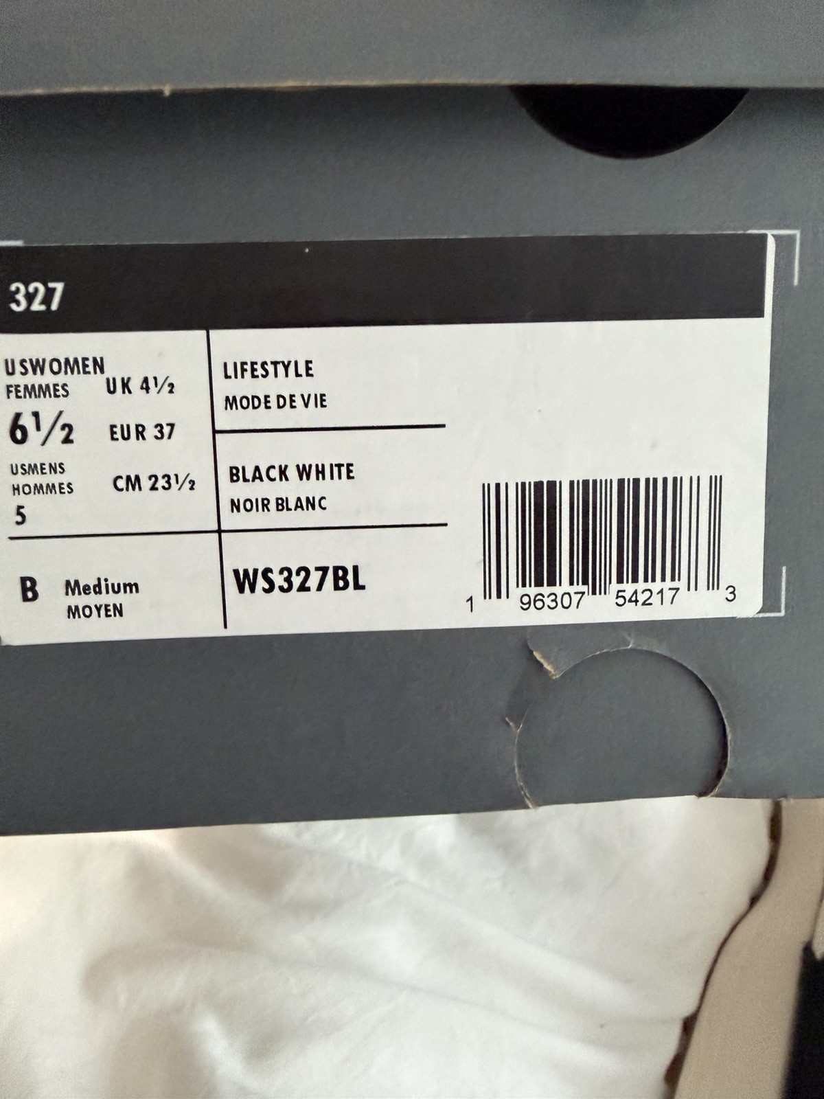 Woman’s Black New Balance 327 Size 6.5