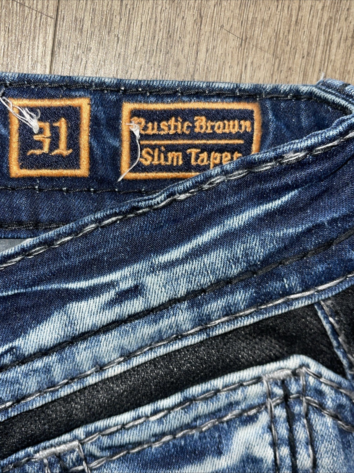 ROCK REVIVAL “ RUSTIC BROWN” Slim Taper Jeans, Size 31/31 Length ￼ Distressed