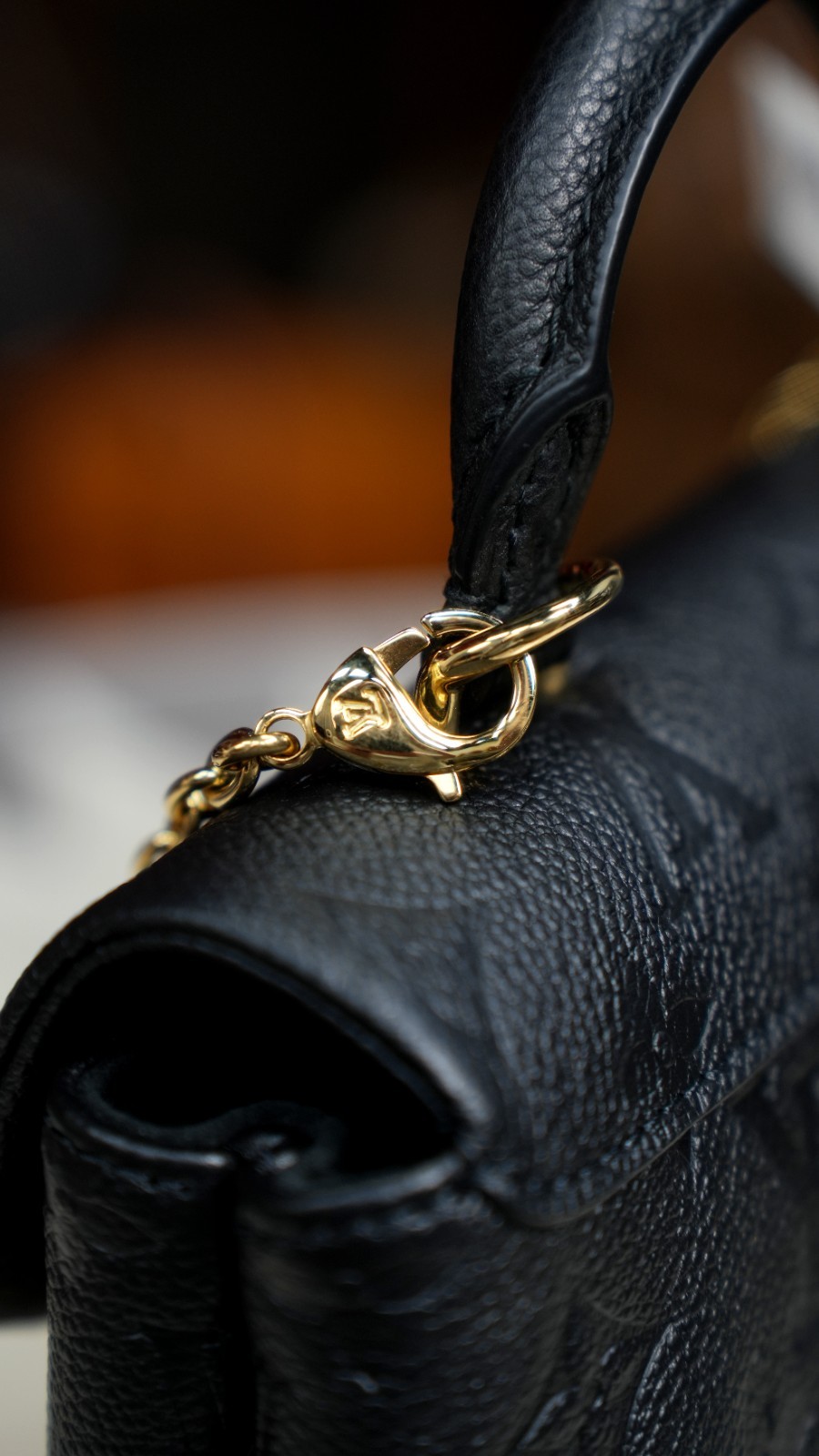 LOUIS VUITTON Madeleine Monogram Empreinte Top Handle Chain Shoulder bag Women