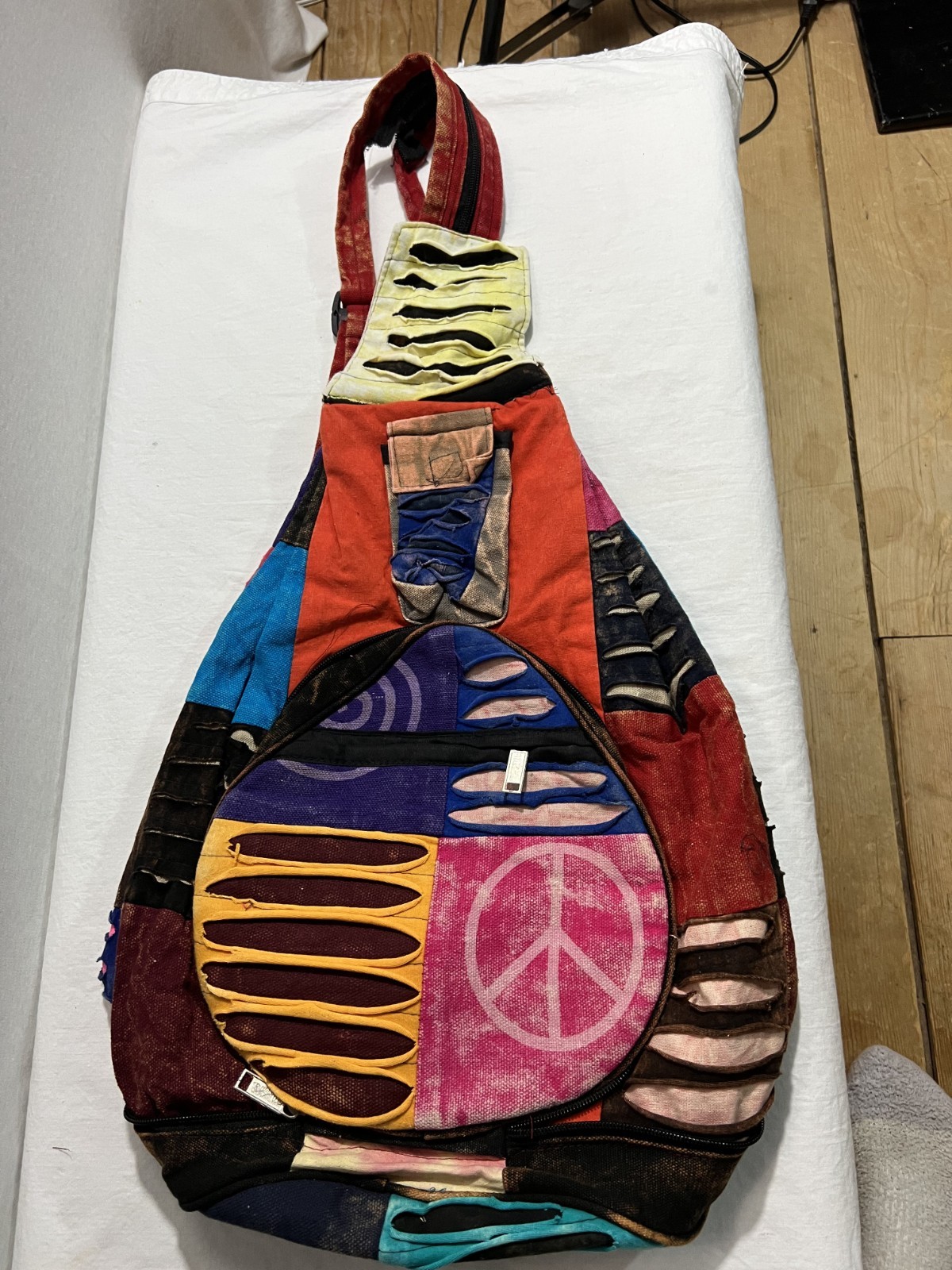 NWOT Patchwork Cotton Fold up Backpack Stonewash Multicolor Peace Sign ~15 x16″