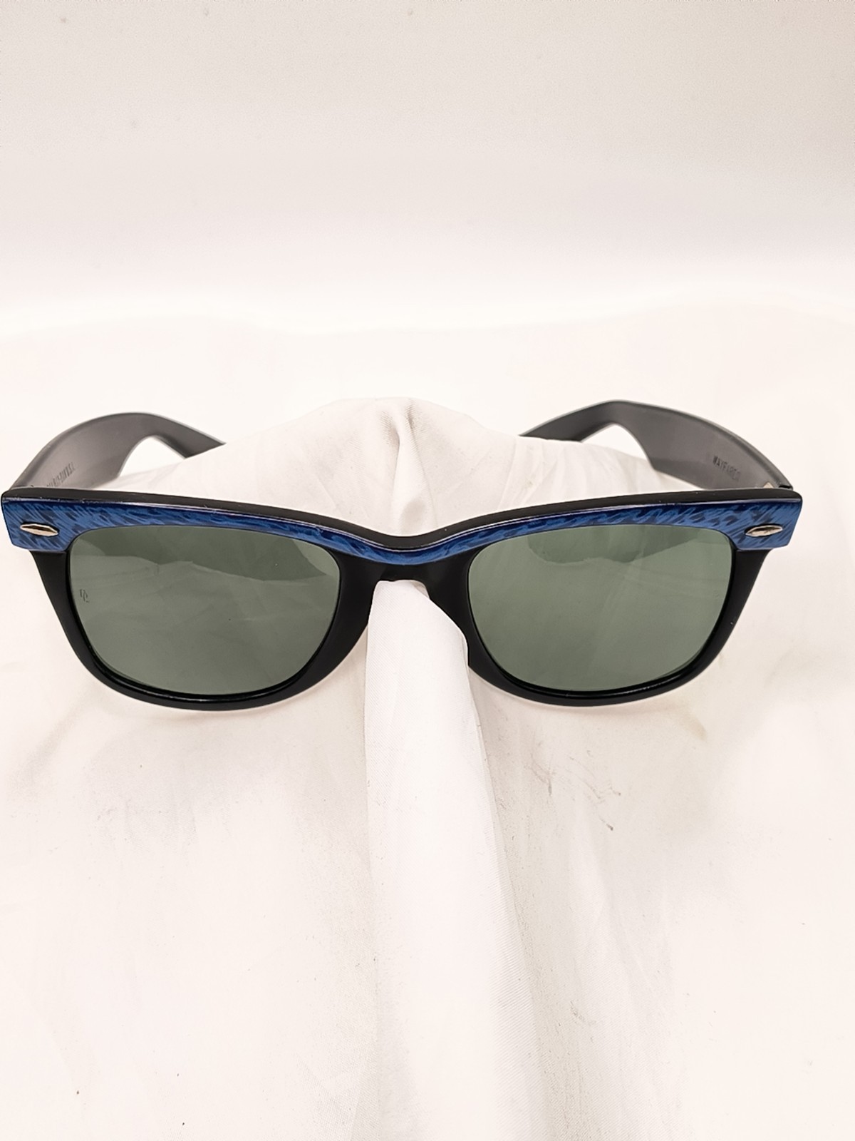 These are vintage B&L Ray-Ban L1723 Wayfarer sunglasses