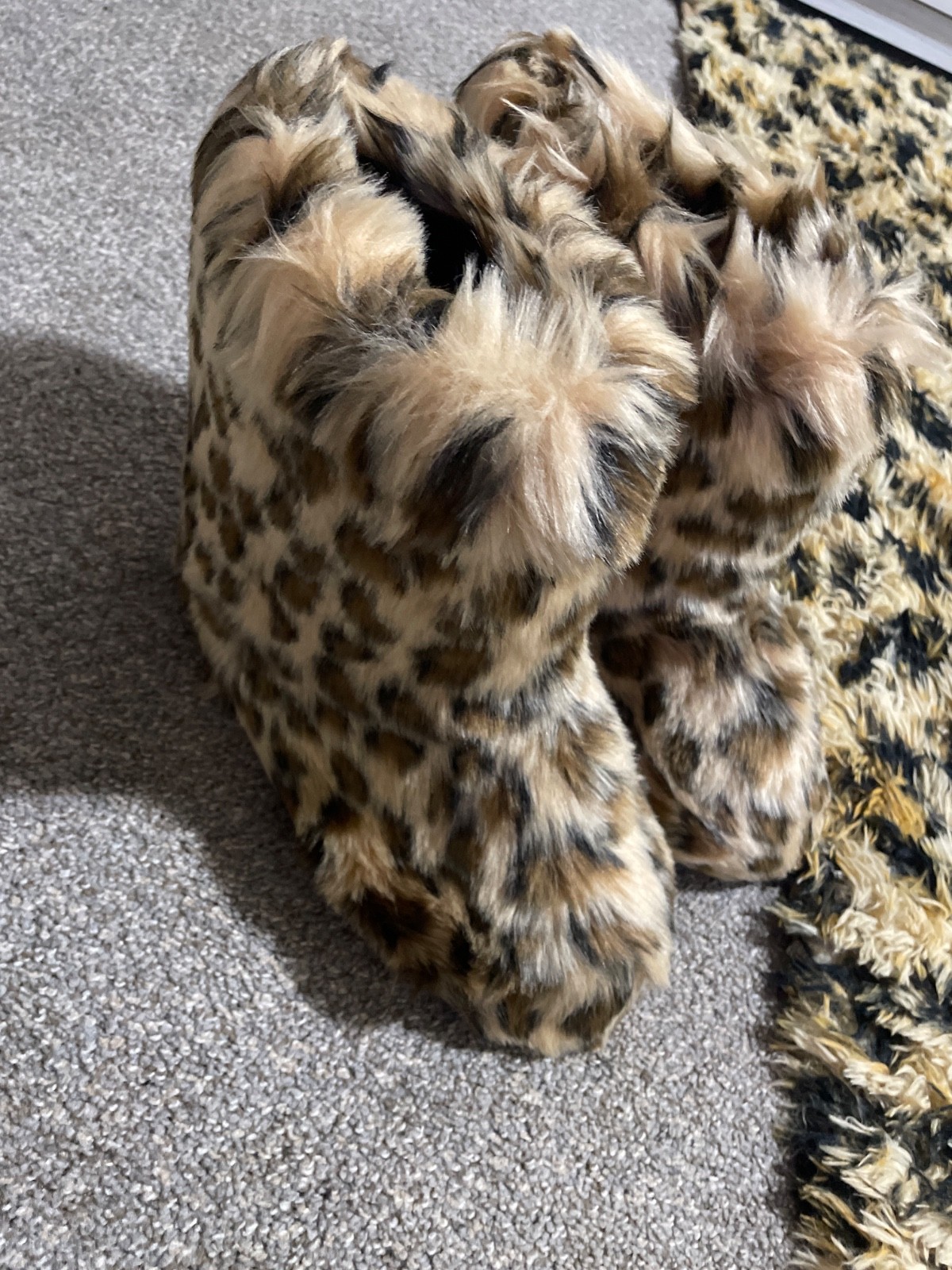 women fur cheetah boots so comfy they are too small for me.