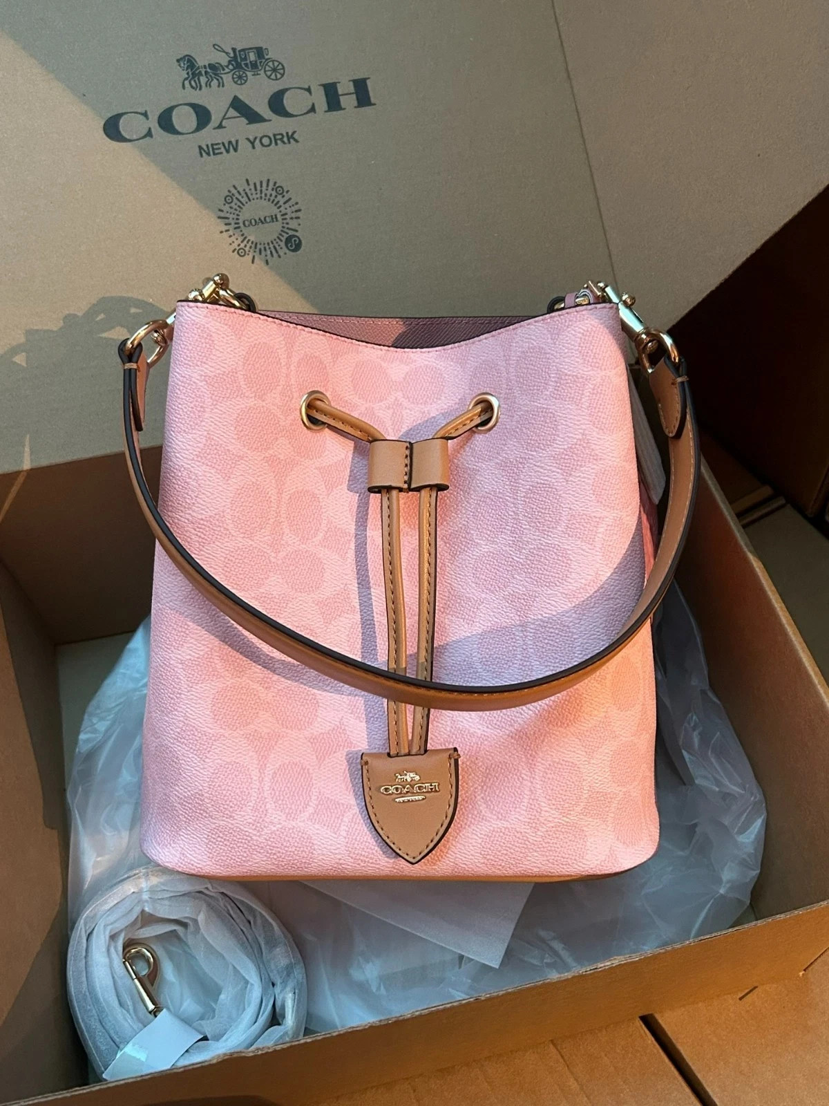 Coach CEA23 Rowan Bucket Bag In Signature Canvas With Charms Powder Pink