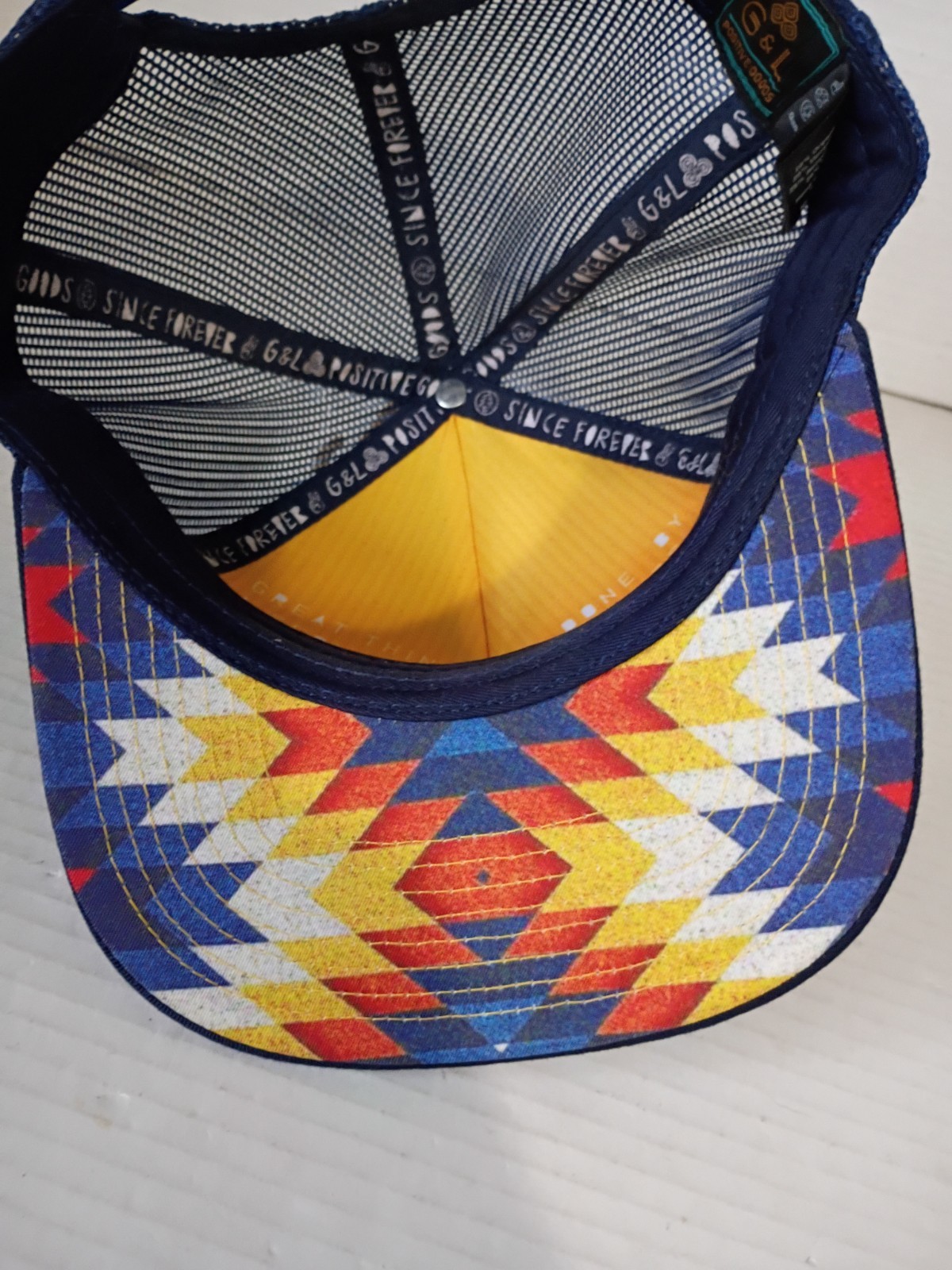 G&L Trucker Hat Santa Fe Positive Goods mesh snap-back blue red yellow adult