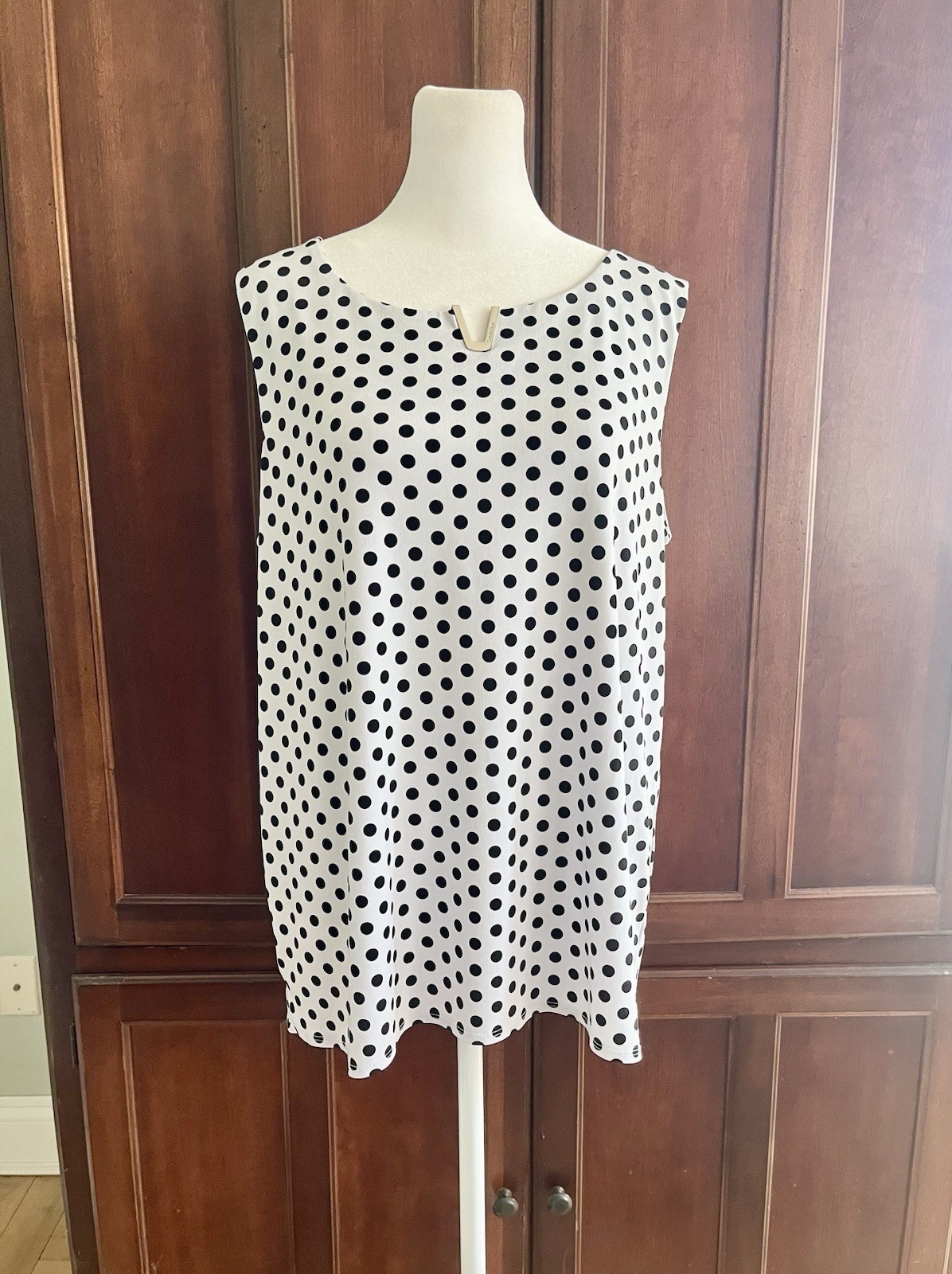 Calvin Klein Sleeveless Black and White Polka Dot Women’s Top with Silver Logo