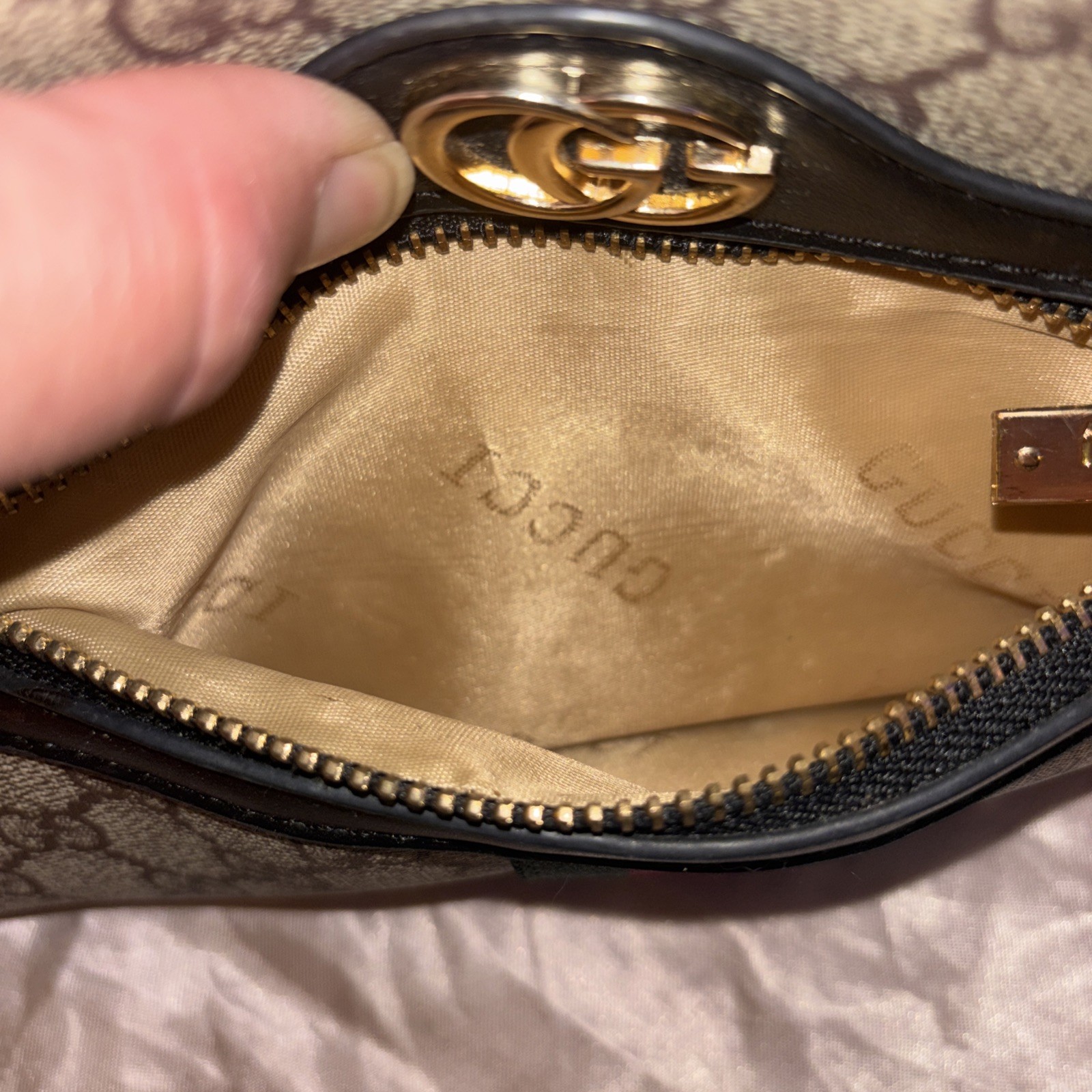 This is a Gucci GG Supreme Ophidia camera-style shoulder bag.