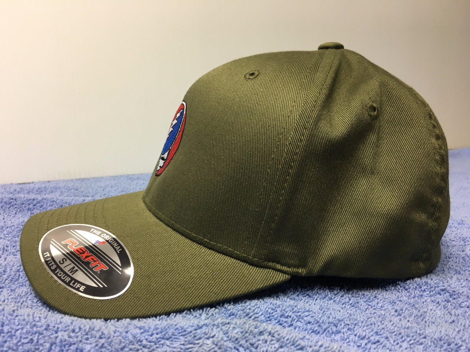 Grateful Dead Steal Your Face Embroidered Flexfit Ball Cap Black, Navy or Olive