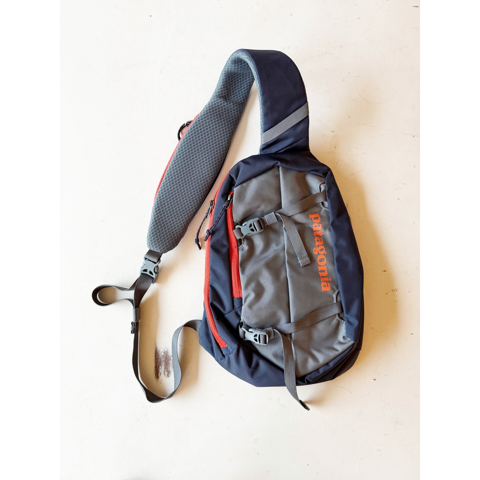 Patagonia Atom 8L Sling Bag Navy Blue Orange Gray