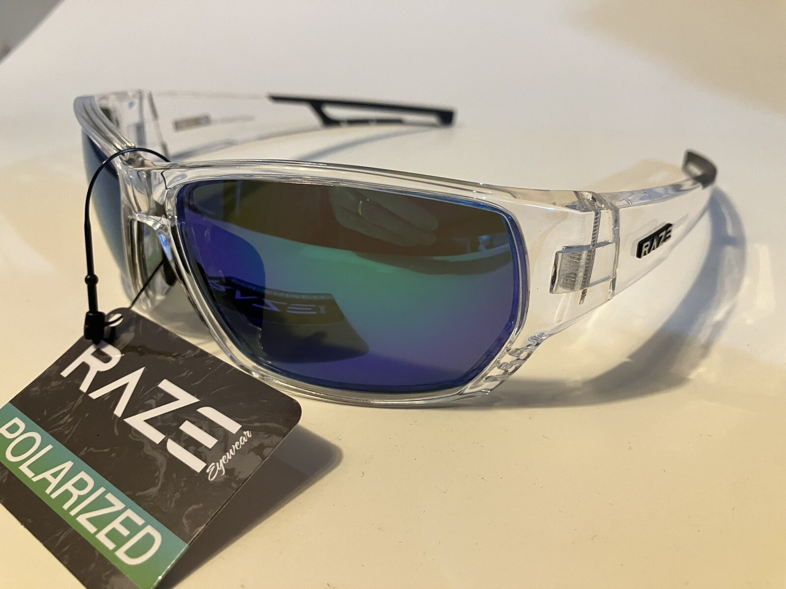 RAZE Eyewear Sunglasses Sonar Polarized Clear Frame Blue Mirror Smoke 28856