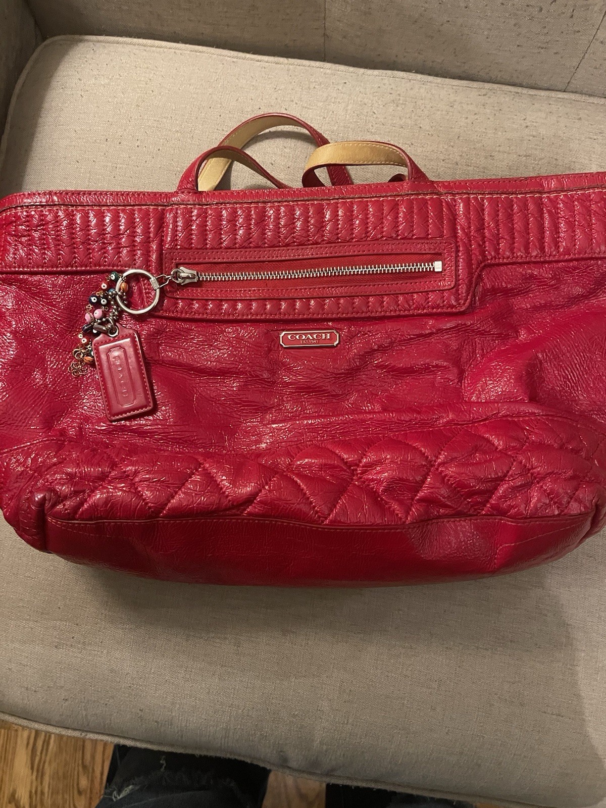 Coach Poppy Daisy Liquid Gloss tote bag, featuring quilted red patent leather