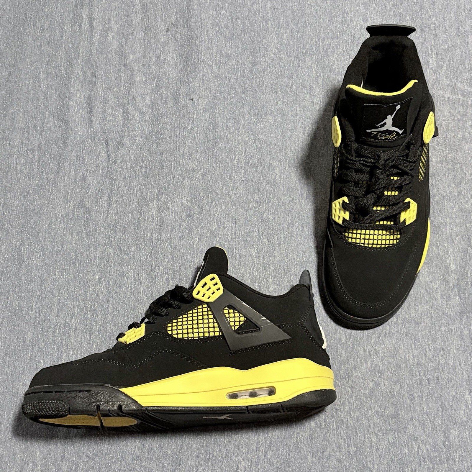 Jordan 4 Retro Thunder. Black/Tour Yellow DH6927-017