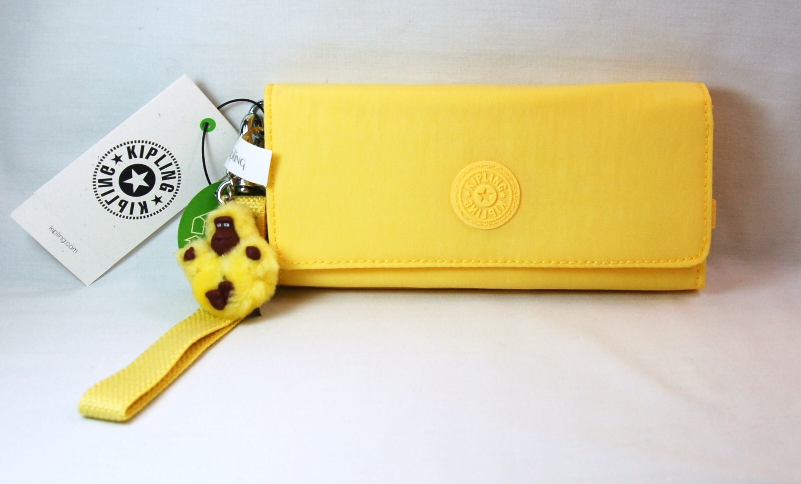 NWT Kipling RUBI LARGE WRISTLET WALLET “Buttery Sun” + ADDIE Bag Charm STK#A