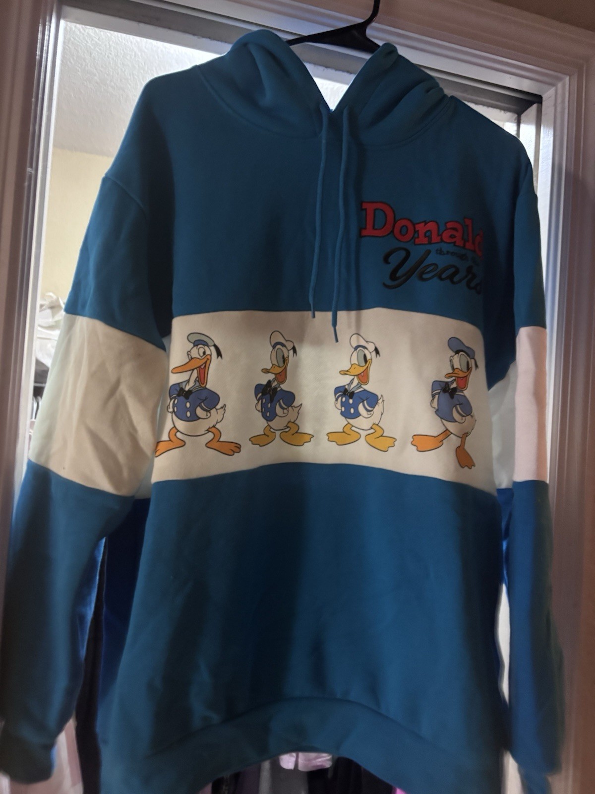 Disney Donald Duck Through the Years Graphic Print Pullover Hoodie Blue/White M
