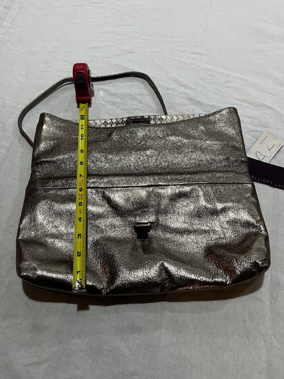 Elliott Lucca metallic woven leather convertible clutch/crossbody bag.