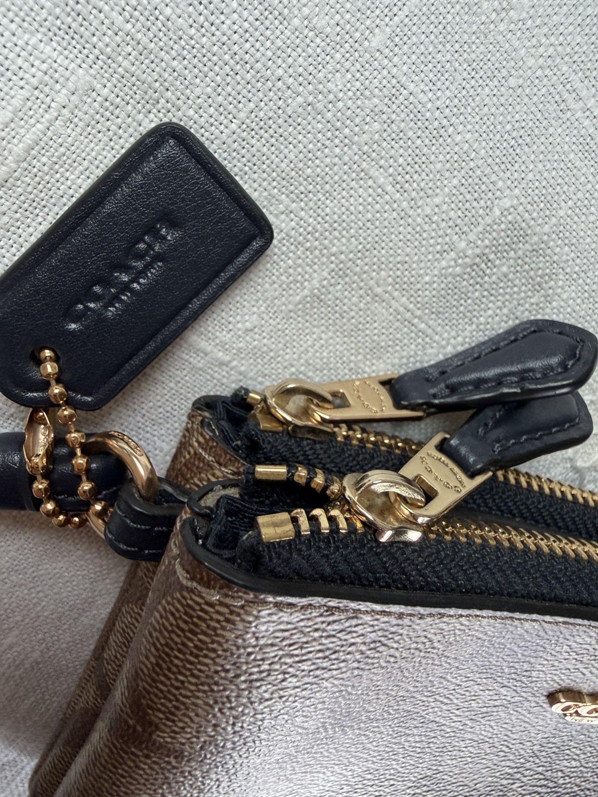 Coach Women’s Corner Zip Wristlet In Signature Canvas 6.25”x 4” x 1”