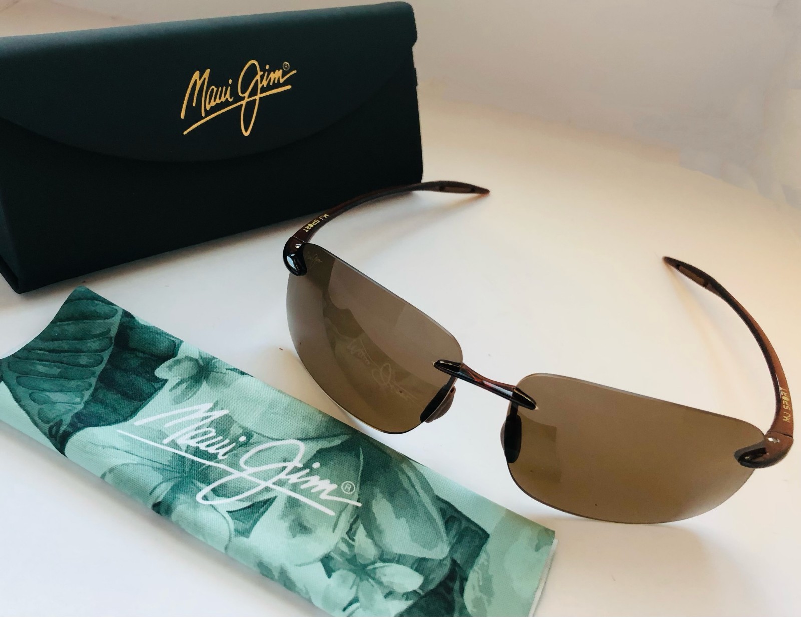 Maui Jim Breakwall H422-26/63-13 127mm Polarized Rimless Sunglasses – Brown