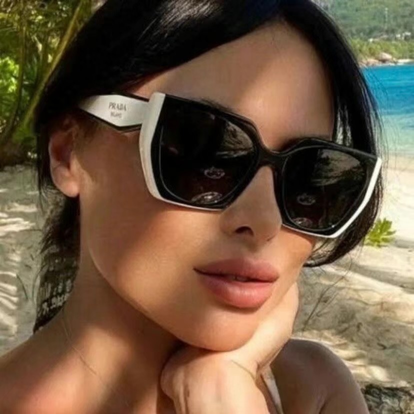 PRADA PR15W White-framed sunglasses with black lenses 54 19-140