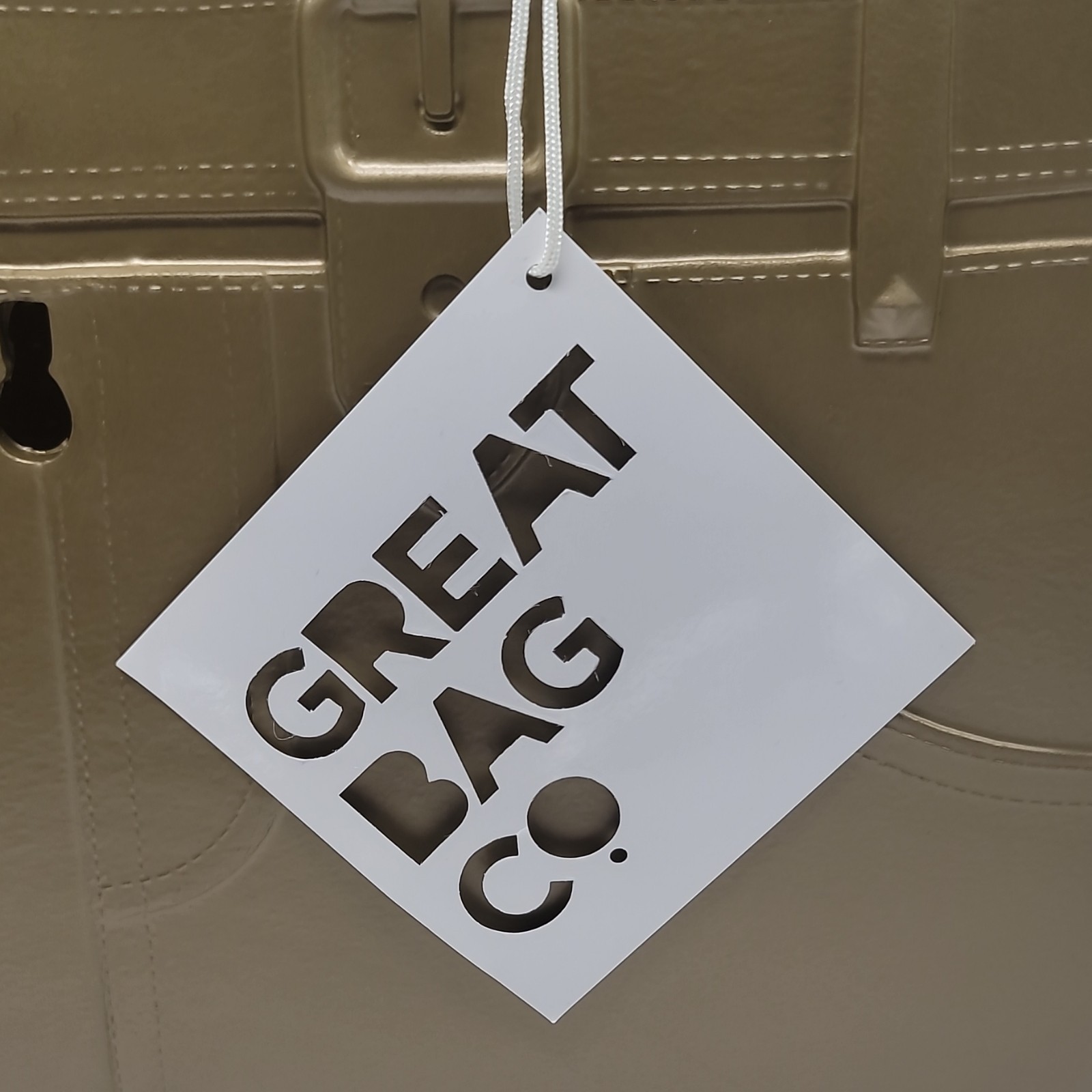 Great Bag Co. Embossed Beige Tote with Buckle Closure and Bottom Studs