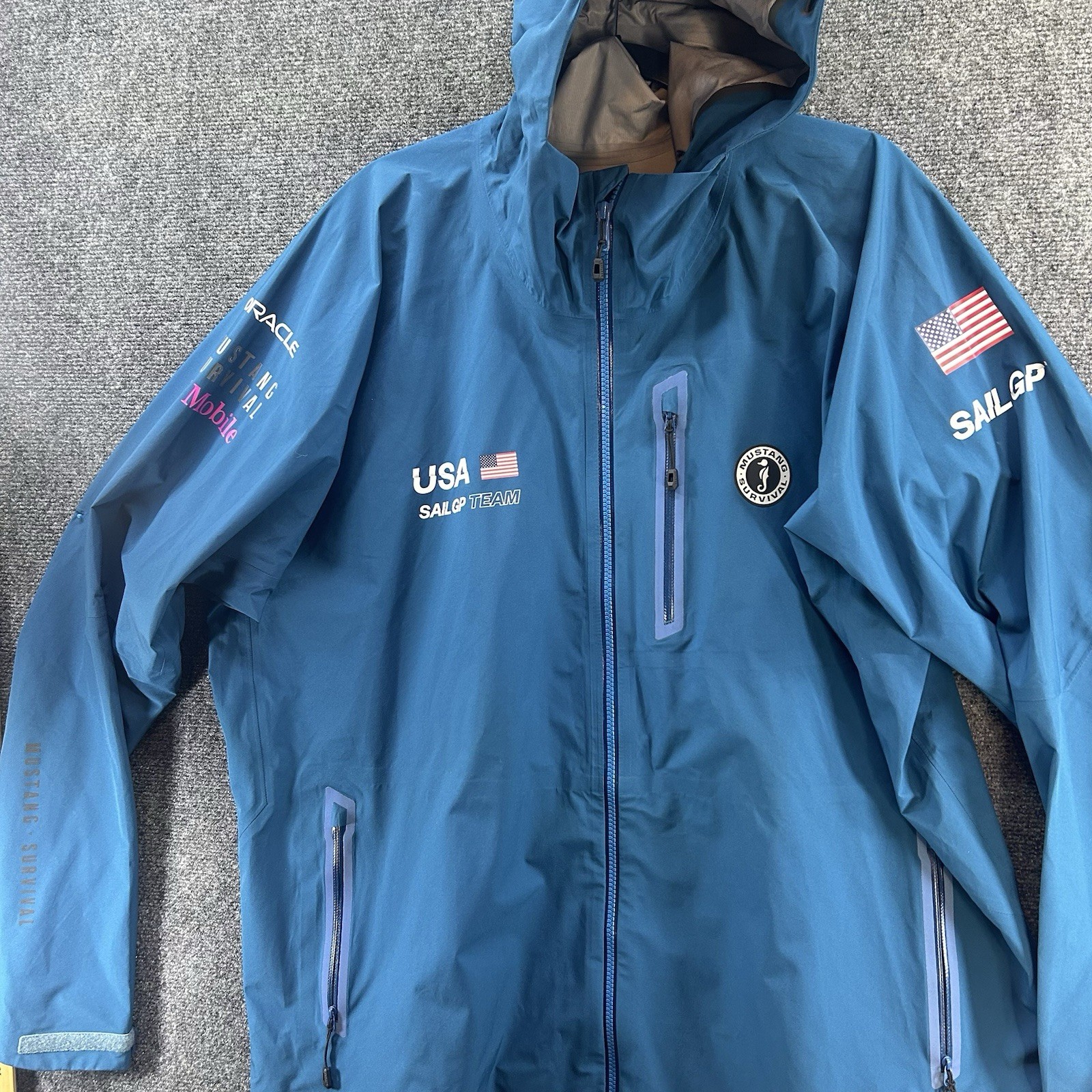 NWOT SailGP Team USA Mustang Survival Rain Jacket XXL Blue Oracle T-Mobile RARE