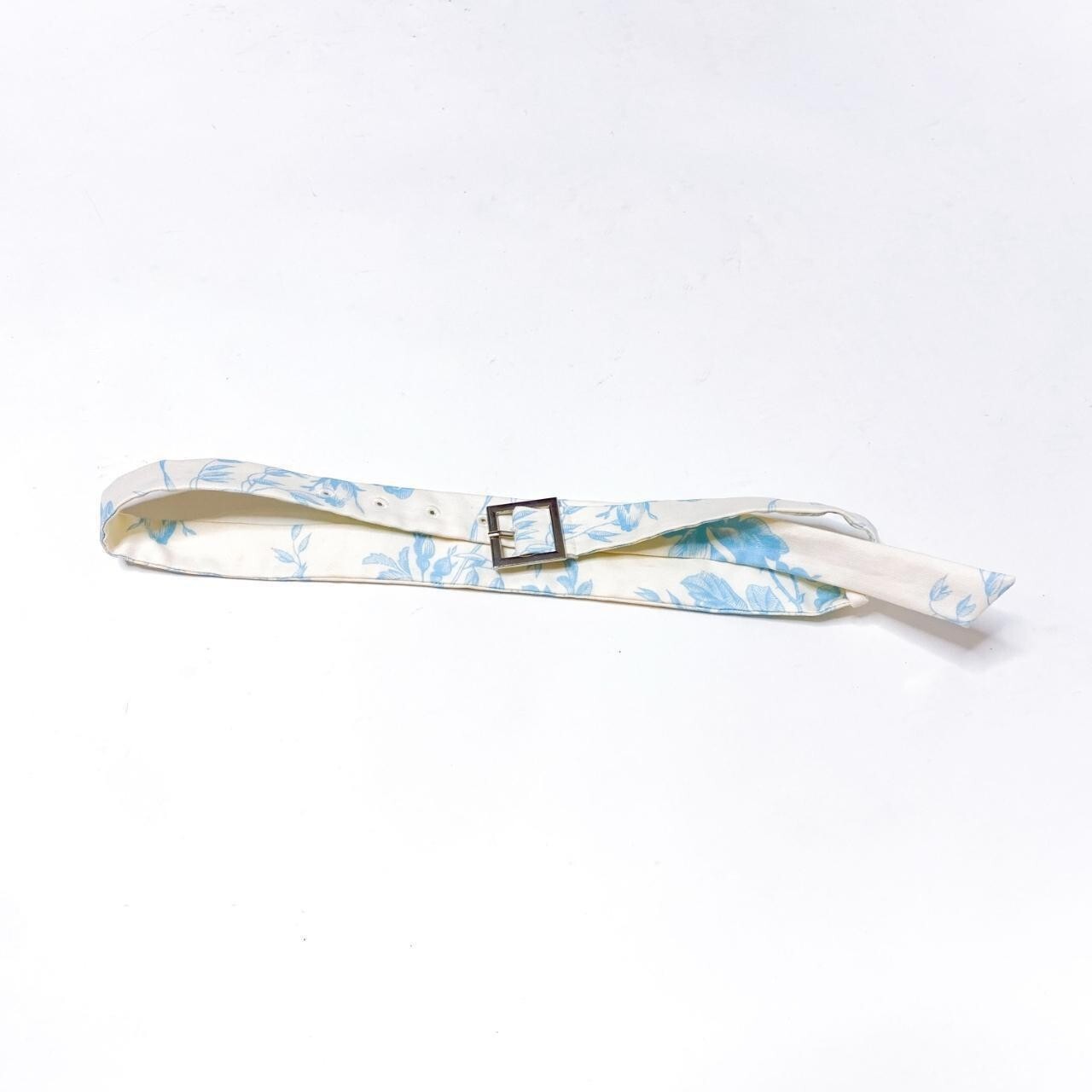 Floral belt Blue and white floral belt with floral toned buckle 27 to 32 inches