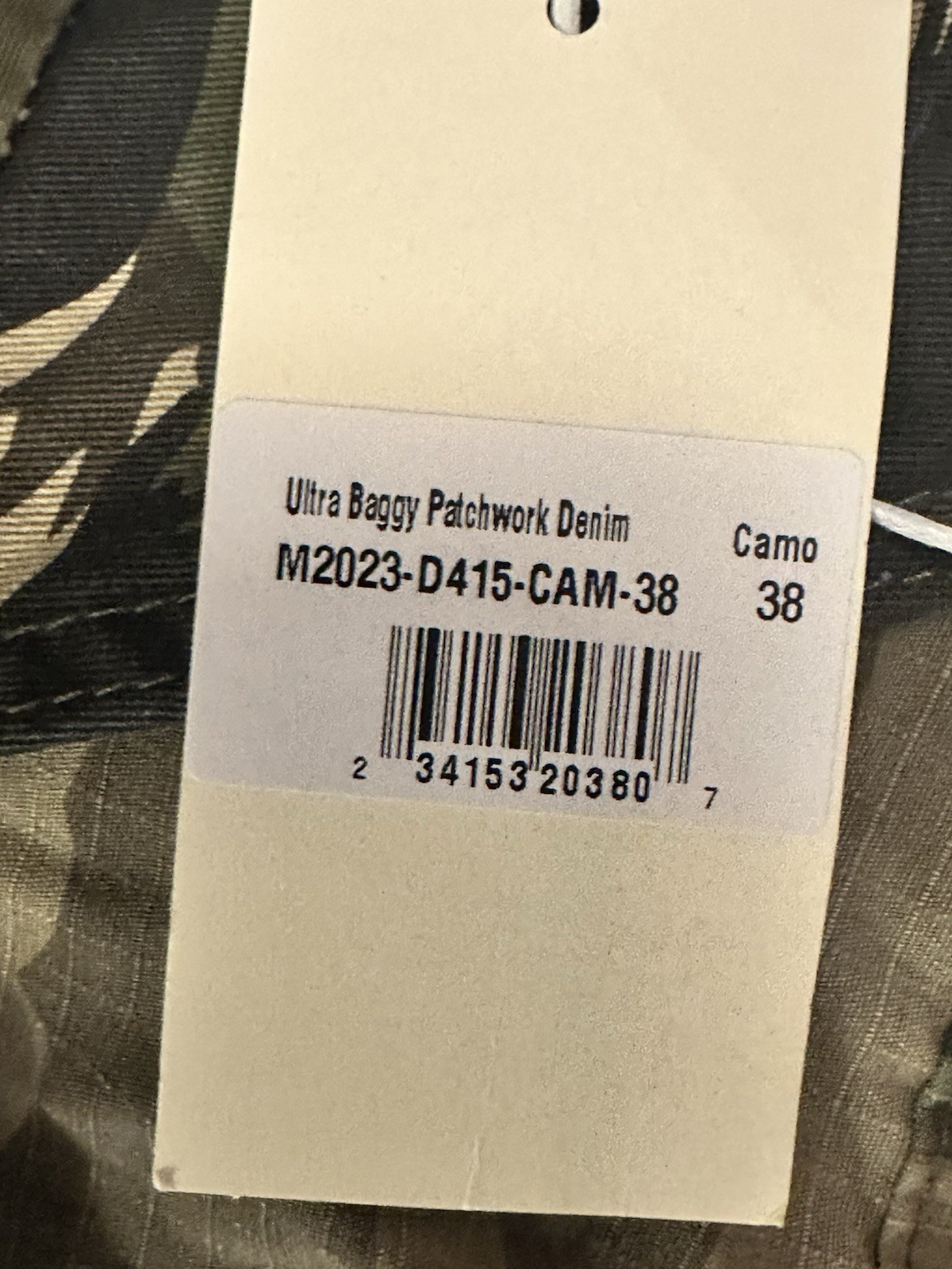MNML Ultra Baggy Patchwork Denim Jeans, mixed camouflage panel design. Size 38