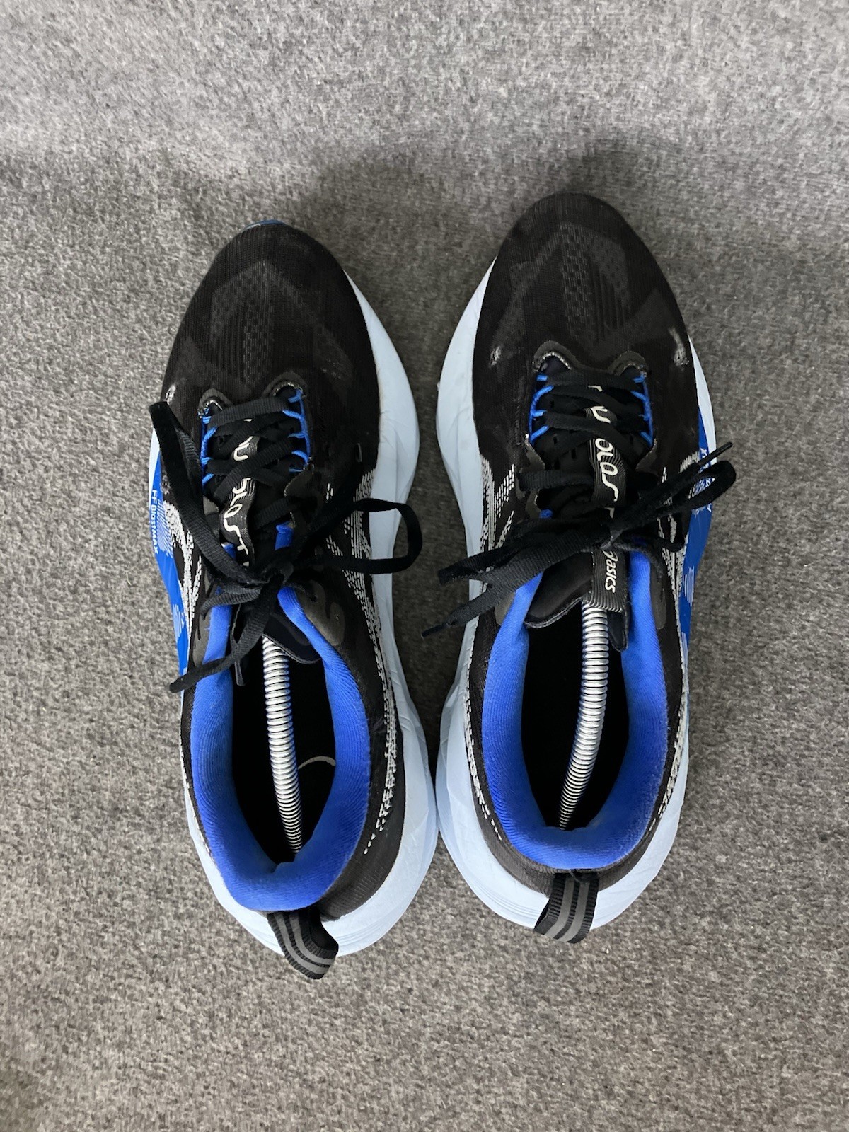 ASICS Novablast 5 Mens 11 Black Blue Running Shoes Sneakers HOLES