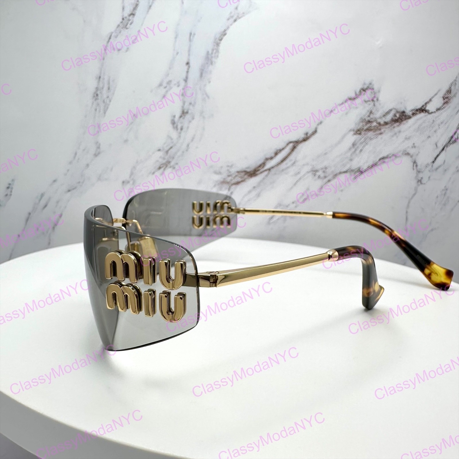 New MIU MIU Sunglasses Gold Slim Runway Wrap Rimless MU A51S 5AK50K Authentic