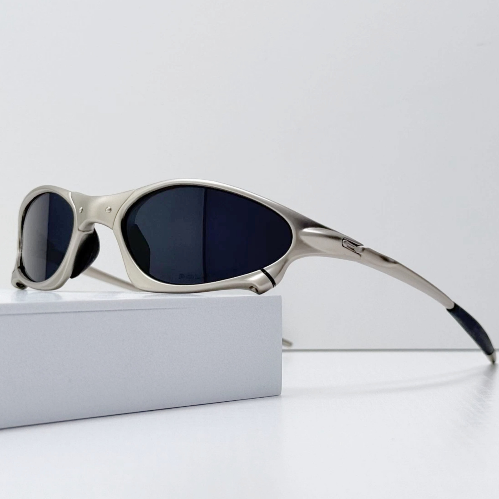 Oakley Penny X-Metal Sunglasses Silver Frame Black Lens Classic