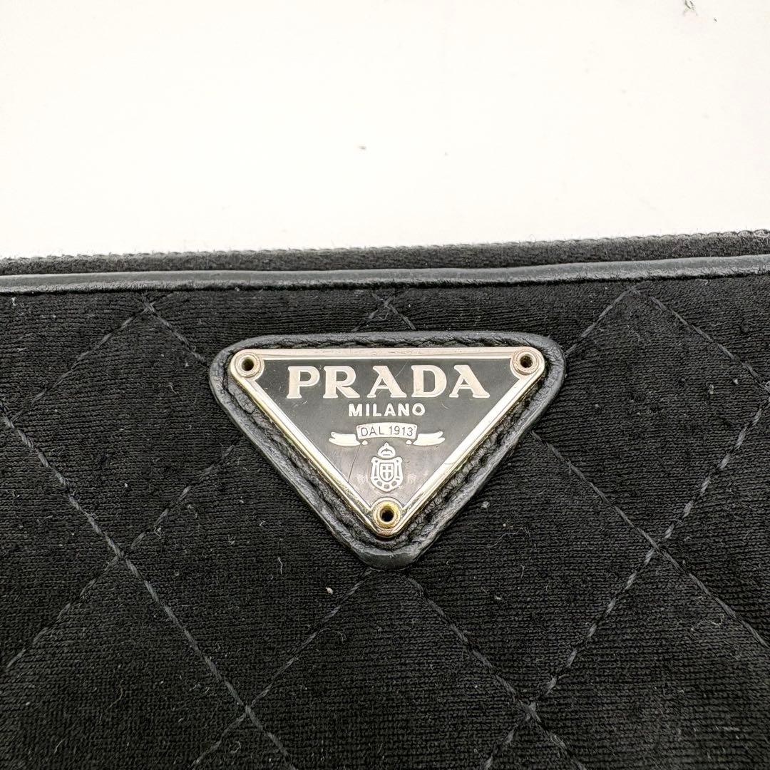 Authenticated PRADA Long Wallet Round Zipper Quilted Triangle Logo Plate Black