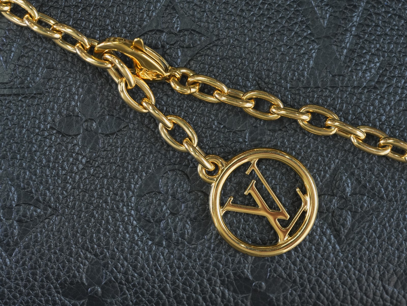 LOUIS VUITTON Madeleine Monogram Empreinte Top Handle Chain Shoulder bag Women