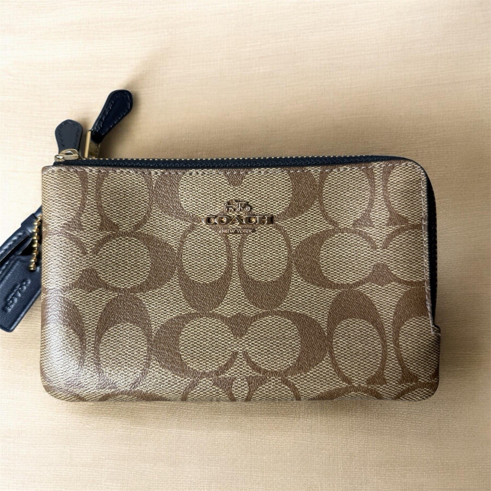 Coach Women’s Corner Zip Wristlet In Signature Canvas 6.25”x 4” x 1”