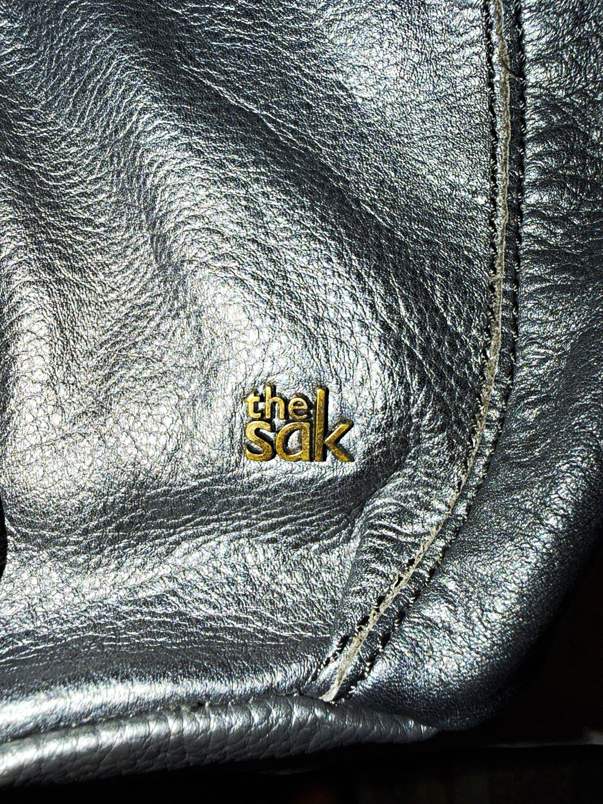 The Sak Black Crossbody Bag Zip Closure Adjustable Strap Inner Pockets Detach