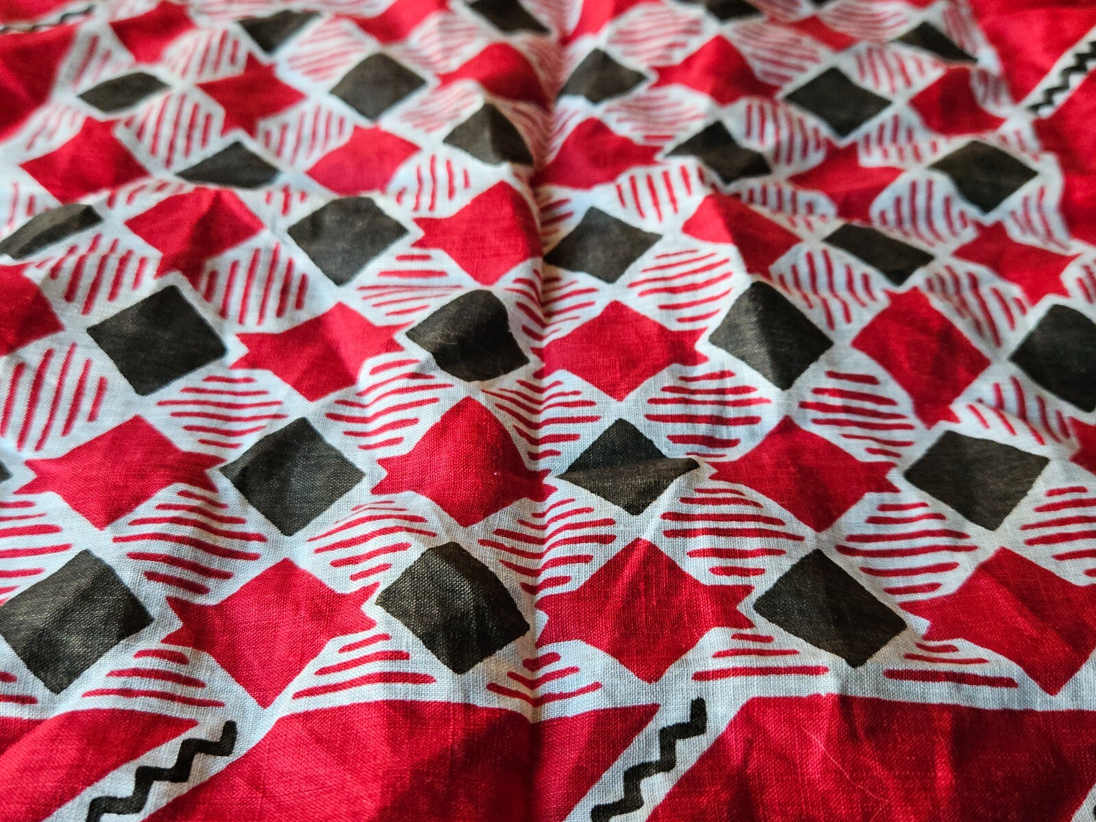 RED, BLACK, WHITE MULTI DESIGN EMBROIDERED EDGE HANDKERCHIEF. 12 1/2 IN.