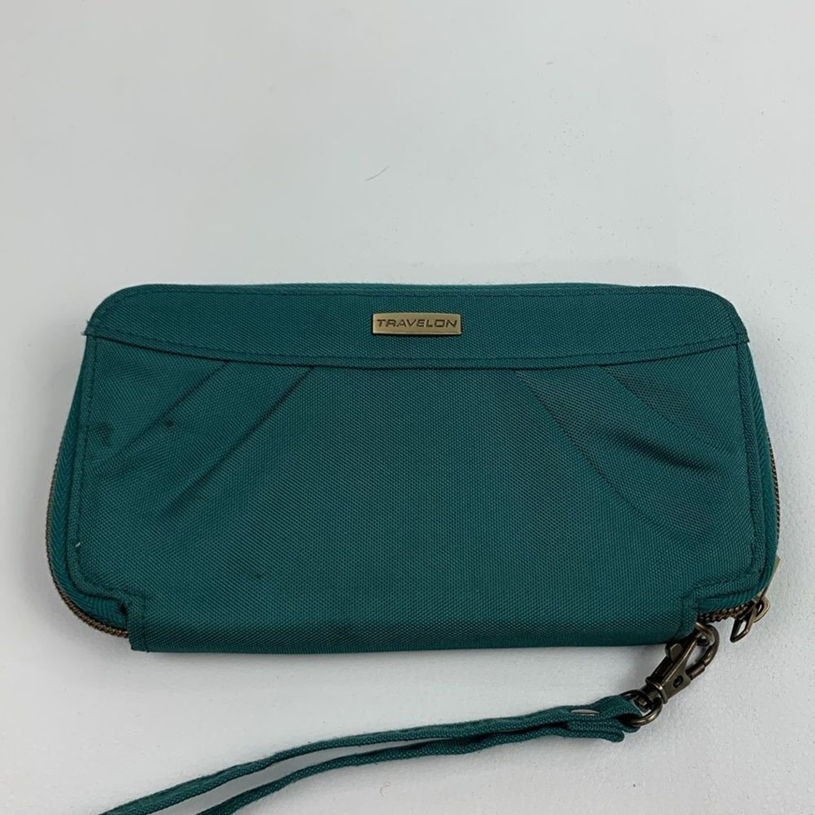 Travelon Dark Teal Green Clutch Wristlet wallet & brass Accents Zip around strap