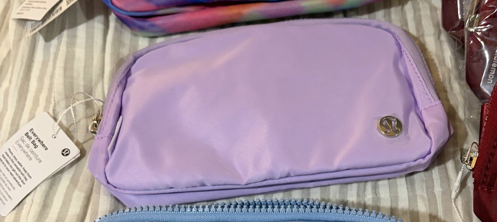 lululemon Purple Solid Belt Bag & Fanny Pack, Crescent Shape, Zip & Logo
