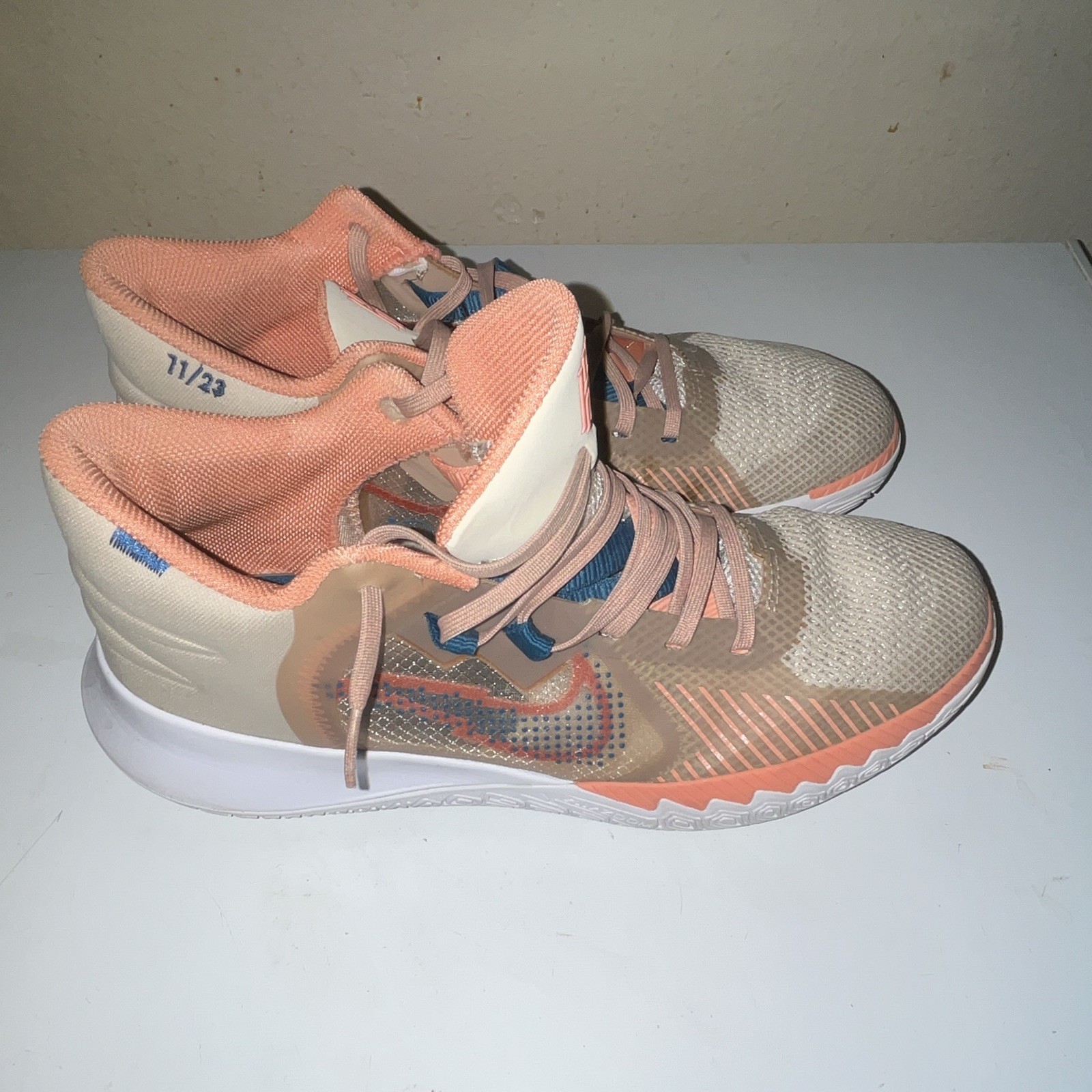 Nike Kyrie Men’s Mid Top Basketball Lace-Up Sneakers Beige Orange Blue