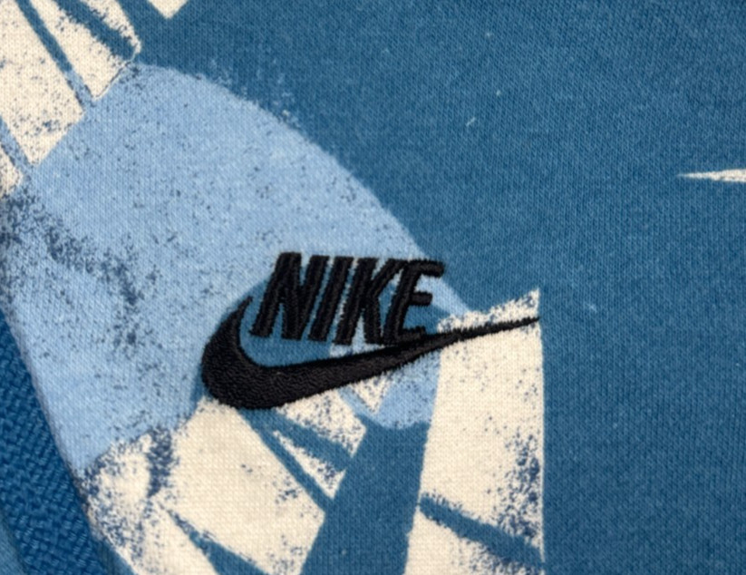 Nike Sportswear Essentials All Over White Nike Logo Print Hoodie – Blue – Size M