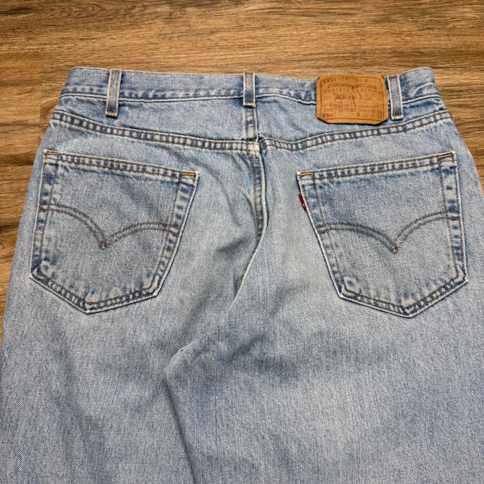 Vintage 90’s Levi’s paper tag light wash style 550 denim jeans Size 34×32